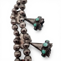 Mid-Century Zuni Turquoise Snake Eye Cluster Bell-Shaped Squash Blossom Necklace