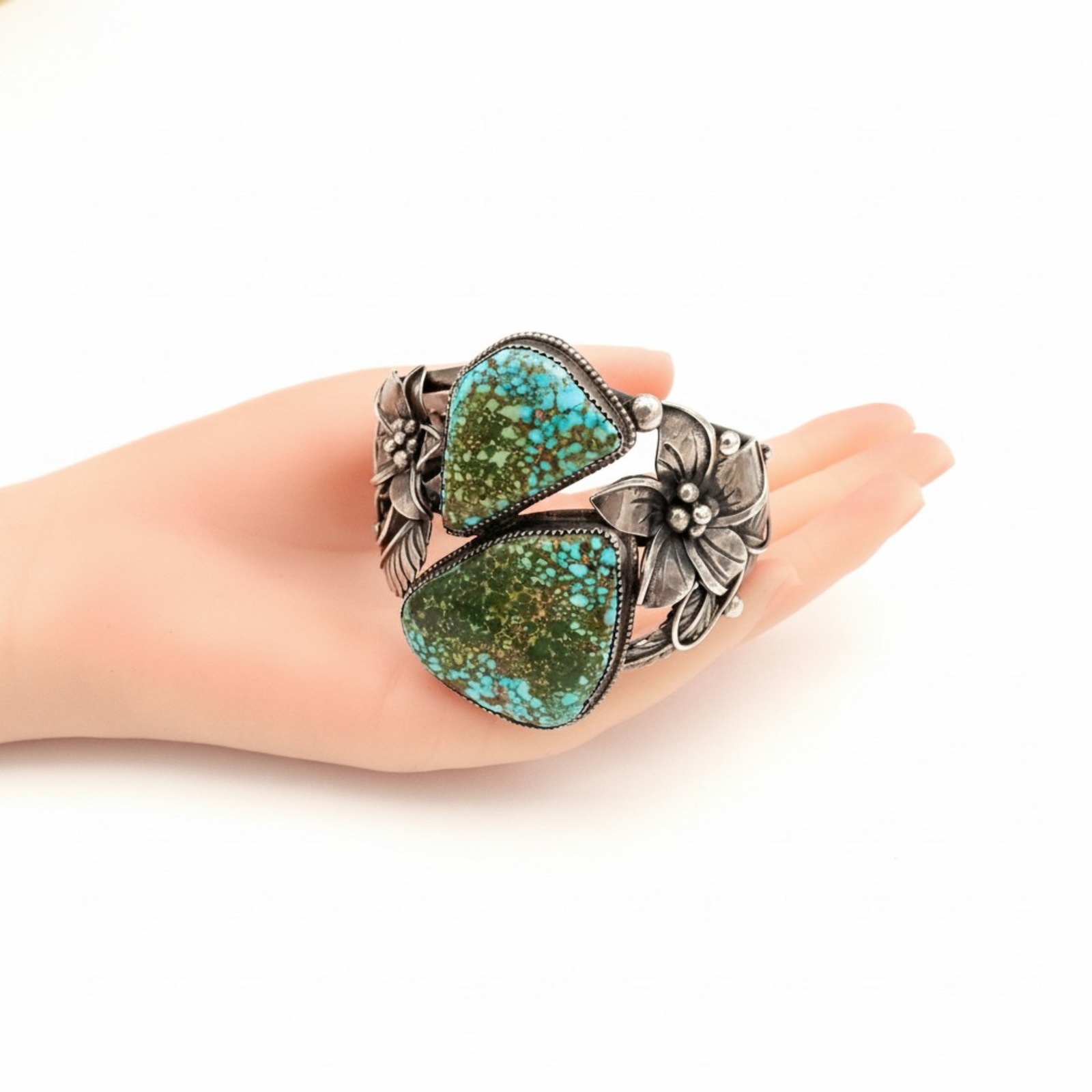 Two-Stone Turquoise Mountain Spiderweb & Sculptural Floral Sterling Cuff Bracelet by Navajo artisan M. CHAVEZ
