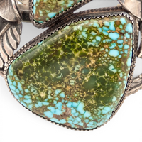 Two-Stone Turquoise Mountain Spiderweb & Sculptural Floral Sterling Cuff Bracelet by Navajo artisan M. CHAVEZ